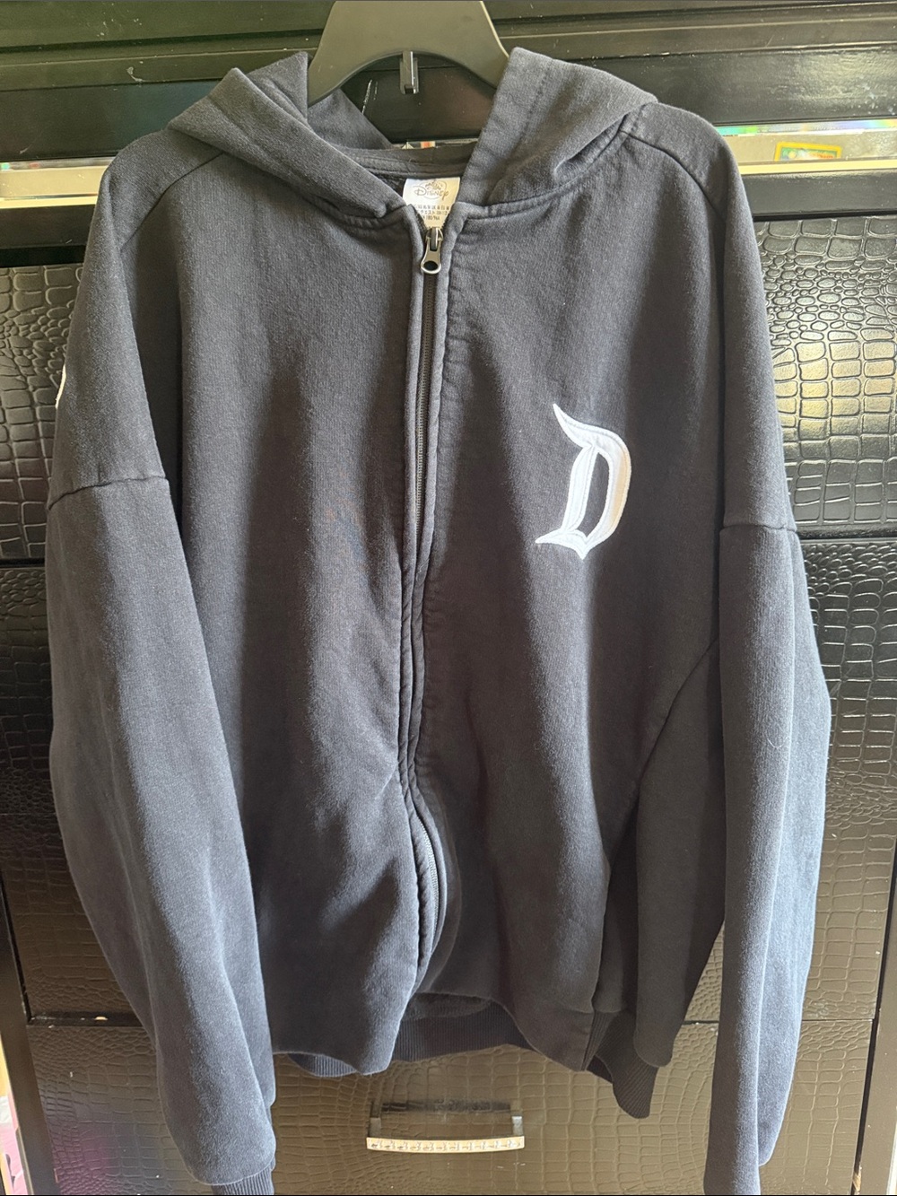 Disney women Black Full-Zip Hoodie with White 'D' Chest Emblem